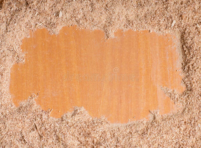 Wood sawdust on wooden background with free copy space. Empty space for text with sawdust.