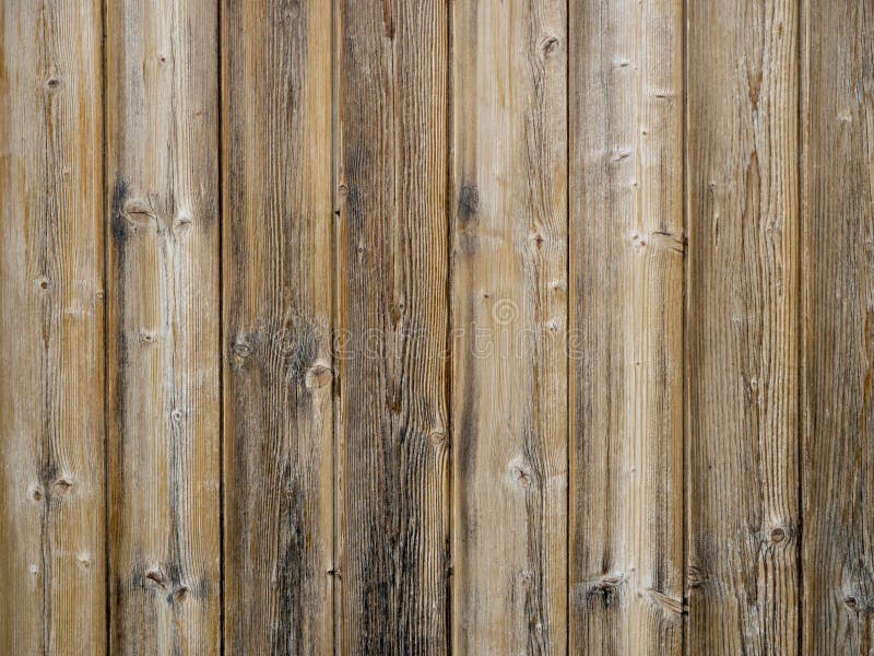 Wood slats background,old exterior cladding with vertical planks. stock photo Wood slats background,old exterior cladding with vertical planks. stock photo