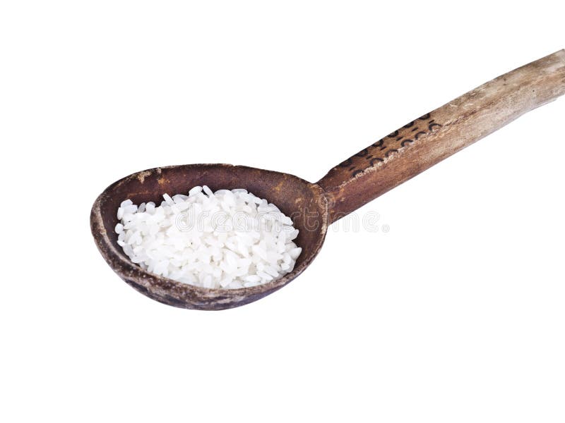 Wood spoon with rice isolated