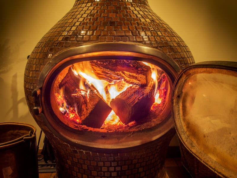 Wood Stove with Logs Burning Inside Stock Image Image of room, black