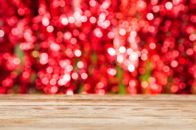 Wood tabellöverkant på röd bokehabstrakt begreppbakgrund royaltyfria foton Wood tabellöverkant på röd bokehabstrakt begreppbakgrund royaltyfria foton