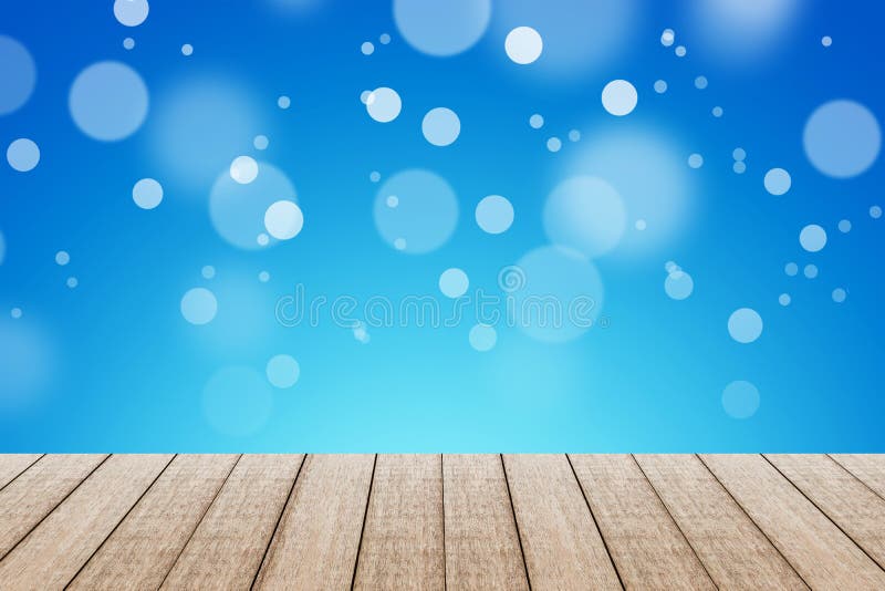 Wood Table with Blue Color Background with Bokeh. Stock Image - Image