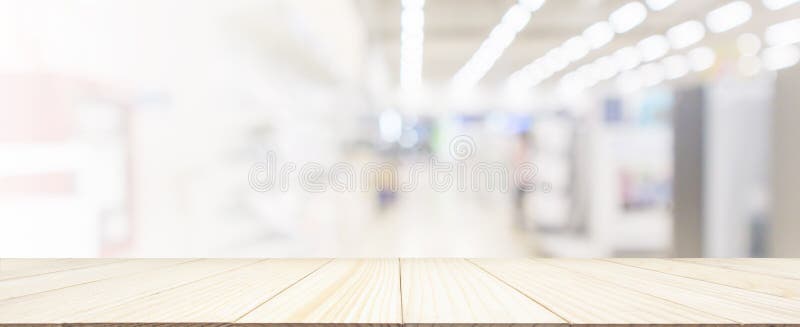 Wood table top with eletronic department store in supermarket shopping mall show Television TV refrigerator and home appliance royalty free stock photography Wood table top with eletronic department store in supermarket shopping mall show Television TV refrigerator and home appliance royalty free stock photography