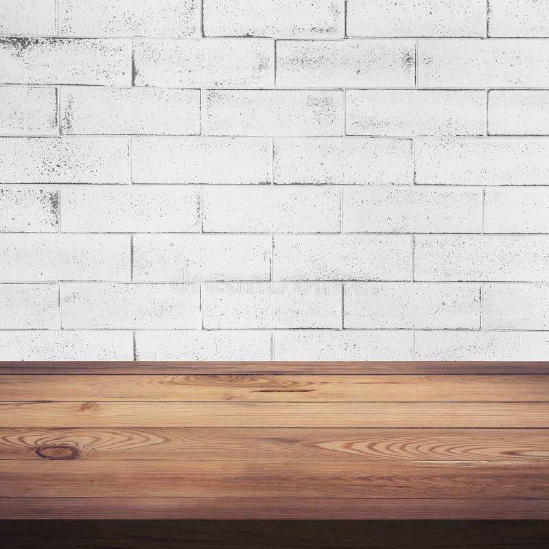 Wood textur för tabell- och vittegelstenväggbakgrund arkivbild Wood textur för tabell- och vittegelstenväggbakgrund arkivbild