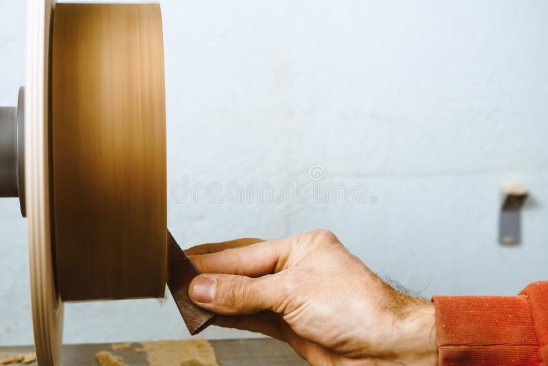 Sanding wood on a lathe stock image. Image of sandpaper 98721379