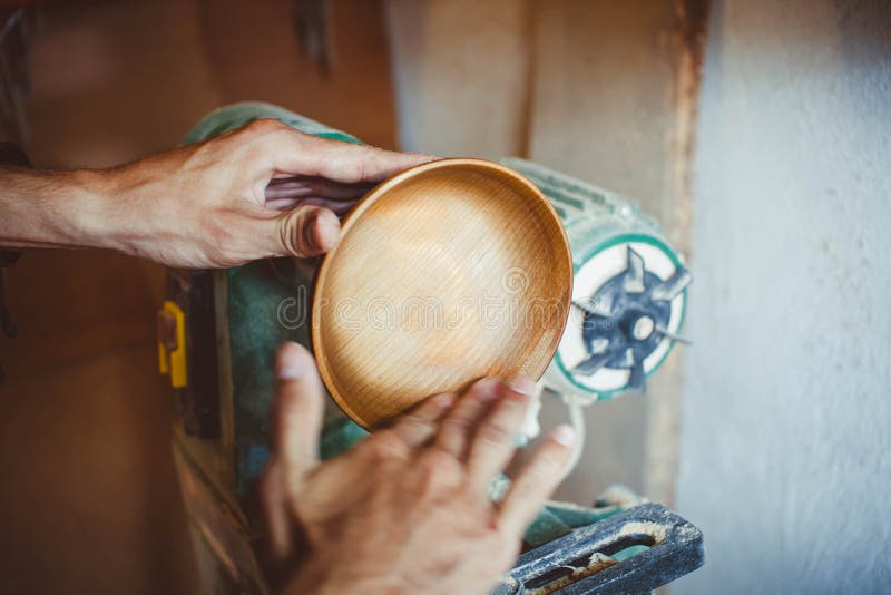 Sanding wood on a lathe stock photo. Image of making 84367780