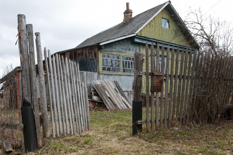 Wooden abandoned house in Russian village stock photos Wooden abandoned house in Russian village stock photos