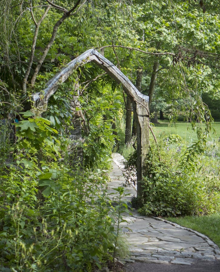 Wooden Arch on a Garden Path stock photos Wooden Arch on a Garden Path stock photos