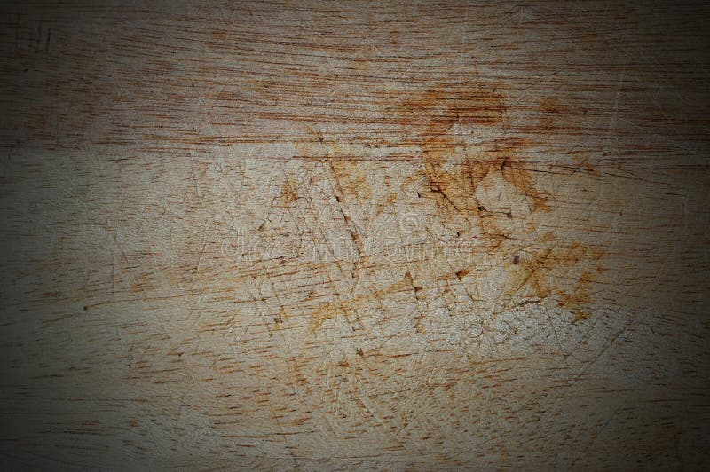 Wooden background with scratch texture vignette.