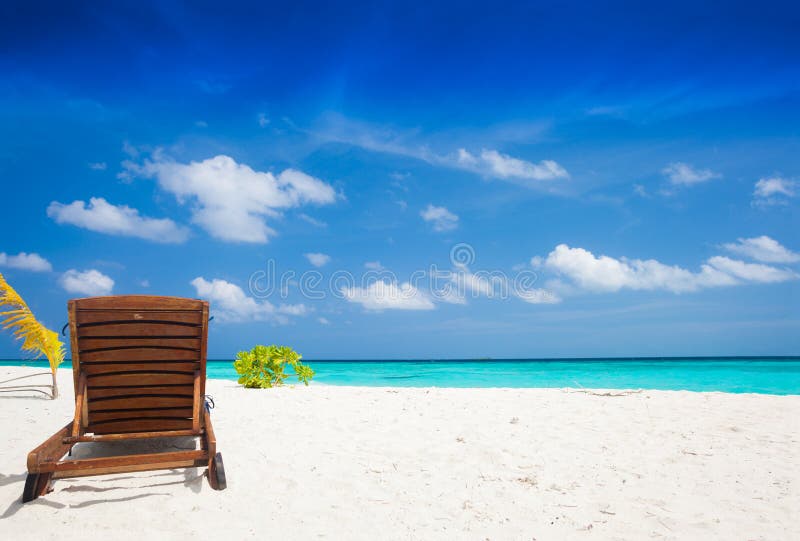 Wooden Beach Chairs on White Sand Topical Beach. Maldives Stock Image ...