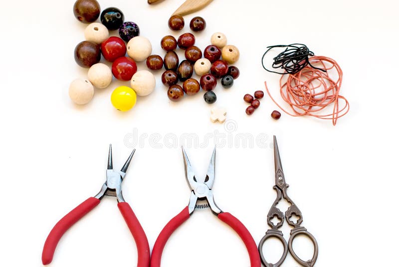 wooden beads and tools for creating fashion jewelry in the manufacturing process