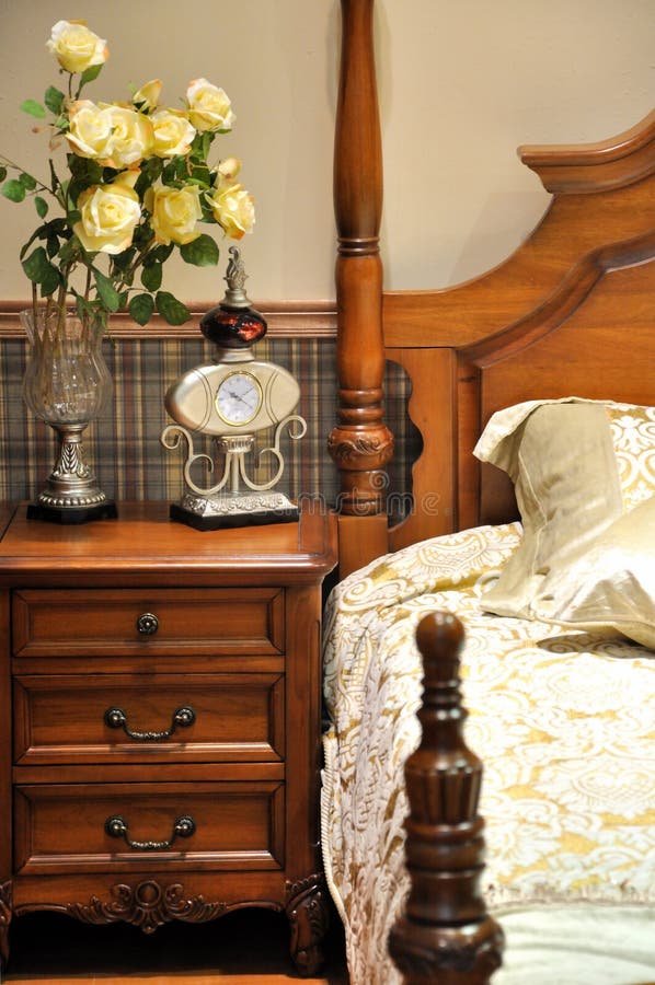 Wooden bed in bedroom