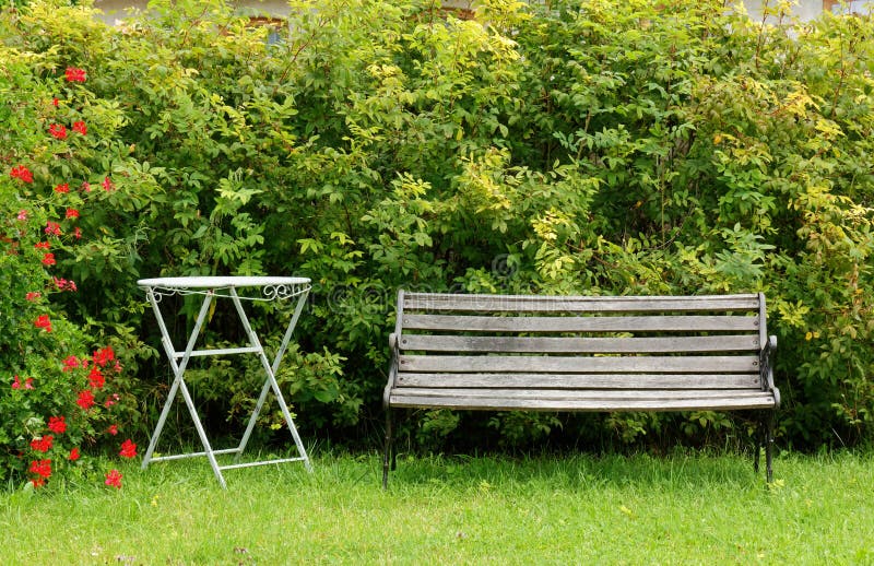 Wooden Bench and Table in a Garden Stock Image Image of garden, leaf