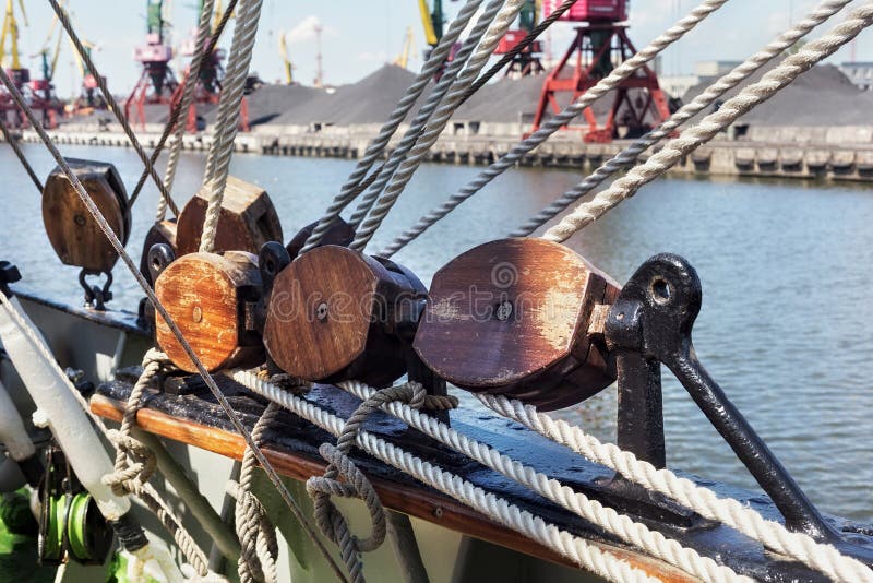 Wooden blocks as part of rigging on a sailing ship. Wooden blocks as part of rigging on a sailing ship.