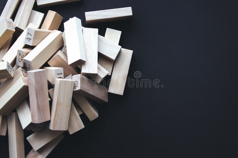 Wooden blocks on brown ground. Leader, individuality, best worker, best employee, idea, team. Business development Decide and choose concept. Copy space.