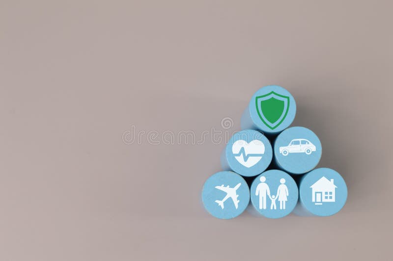 Wooden blocks with insurance icons. Family life, health, vehicle, travel and home. Wooden blocks with insurance icons. Family life, health, vehicle, travel and home.