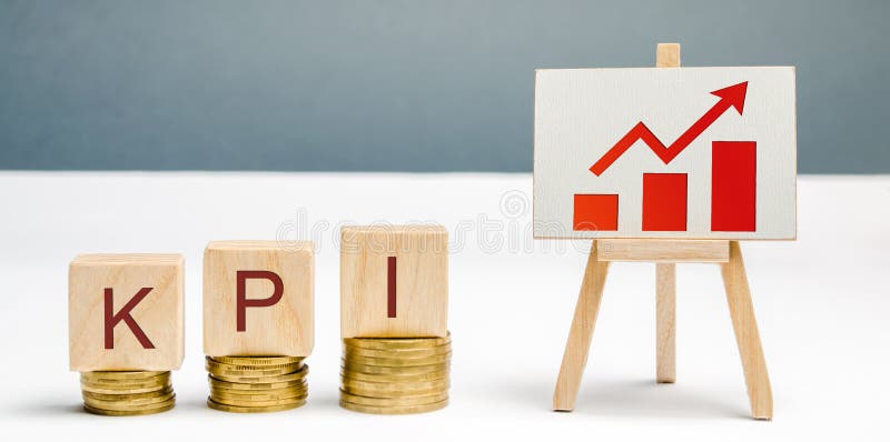 Wooden blocks with the word KPI, the graph with an arrow up. Key Performance Indicator. Planning and implementing a business royalty free stock photo Wooden blocks with the word KPI, the graph with an arrow up. Key Performance Indicator. Planning and implementing a business royalty free stock photo
