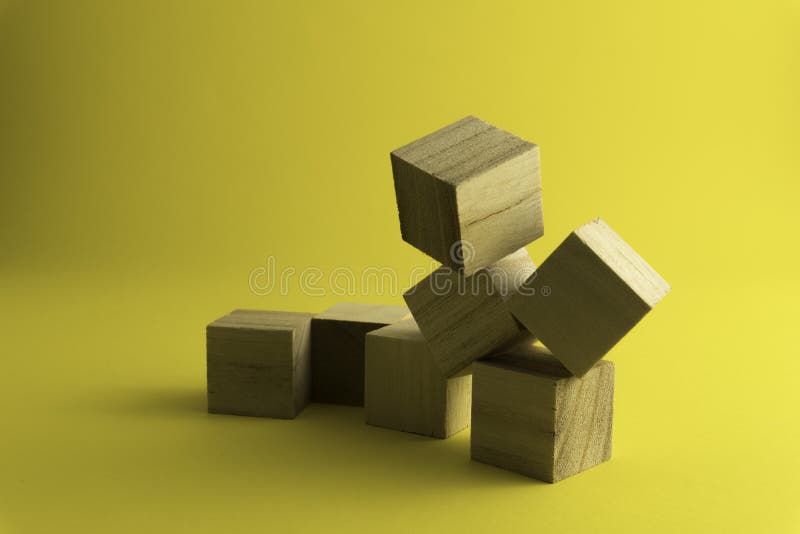 Wooden Blocks on a Yellow Background Stock Photo Image of group
