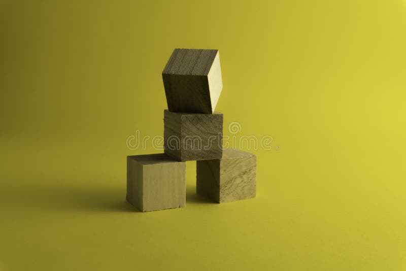 Wooden Blocks on a Yellow Background. Stock Image Image of group