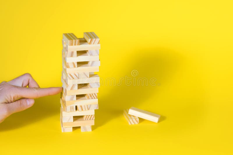 Jenga Pulling Piece Out Stock Photos - Free & Royalty-Free Stock Photos ...