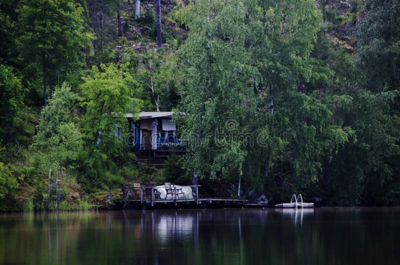 Wooden boat house in the lake royalty free stock photo Wooden boat house in the lake royalty free stock photo