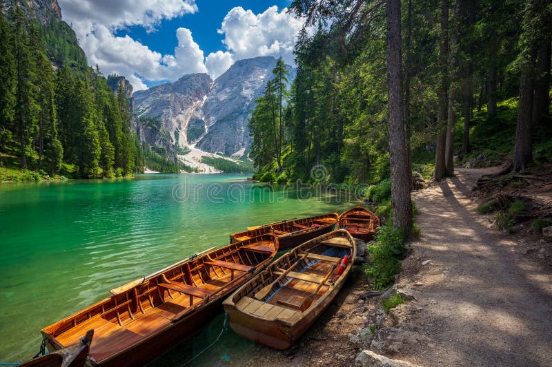 Wooden boat pier at lake Braies, Southern Tyrol, Dolomites, Italy