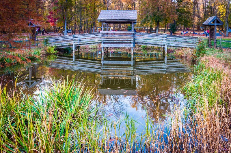 Wooden bridge over small pond in Leesylvania State Park, Virginia.