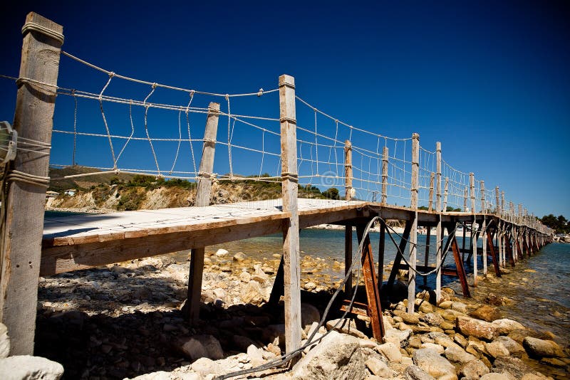 Wooden bridge with ropes