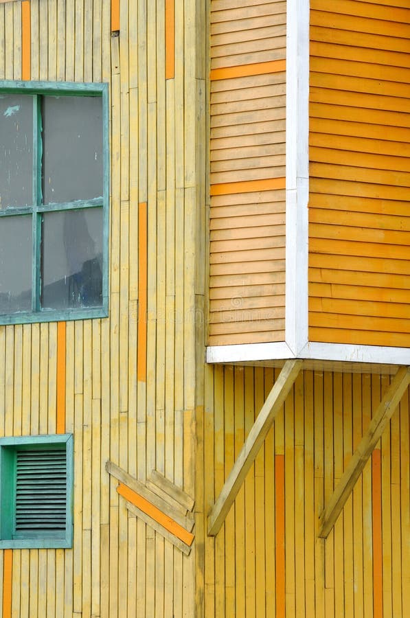 Wooden building in yellow and orange