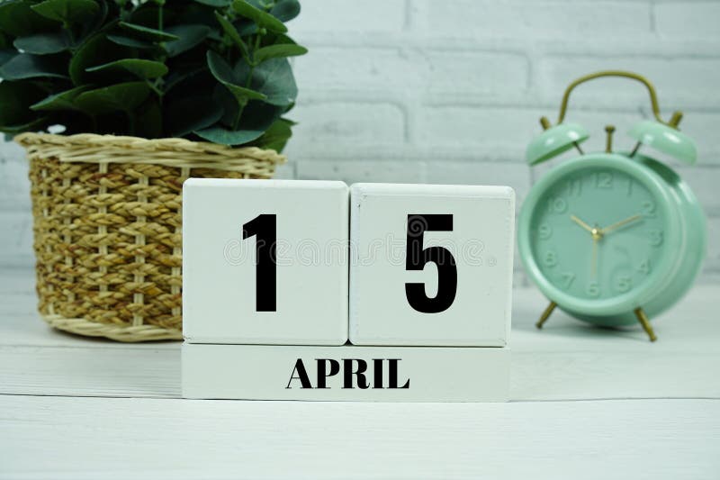 Wooden Calendar Showing the Date of April 15th. Day 15 of April month royalty free stock photo