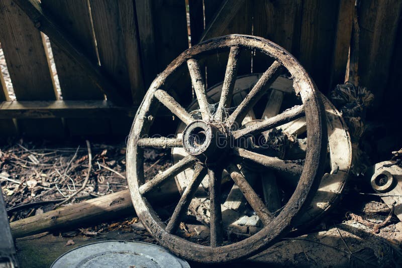 Wooden Cart Wheel Stands in an Old Stock Image Image of artistic