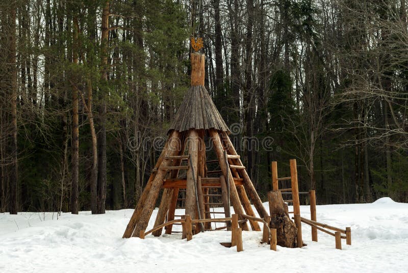 Wooden children`s playground in the winter forest park stock photo Wooden children`s playground in the winter forest park stock photo