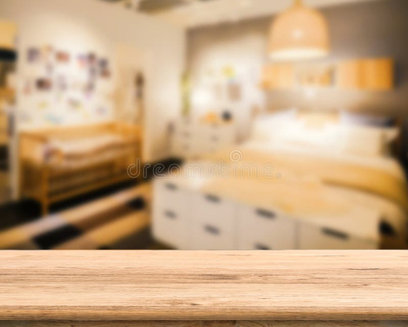 Wooden counter with bedroom background stock photo