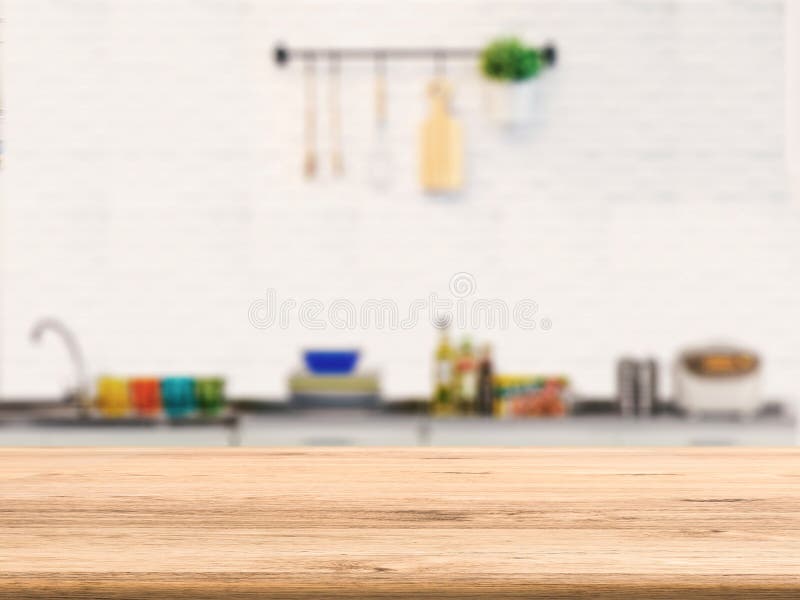 Wooden counter with kitchen cabinet background royalty free stock images