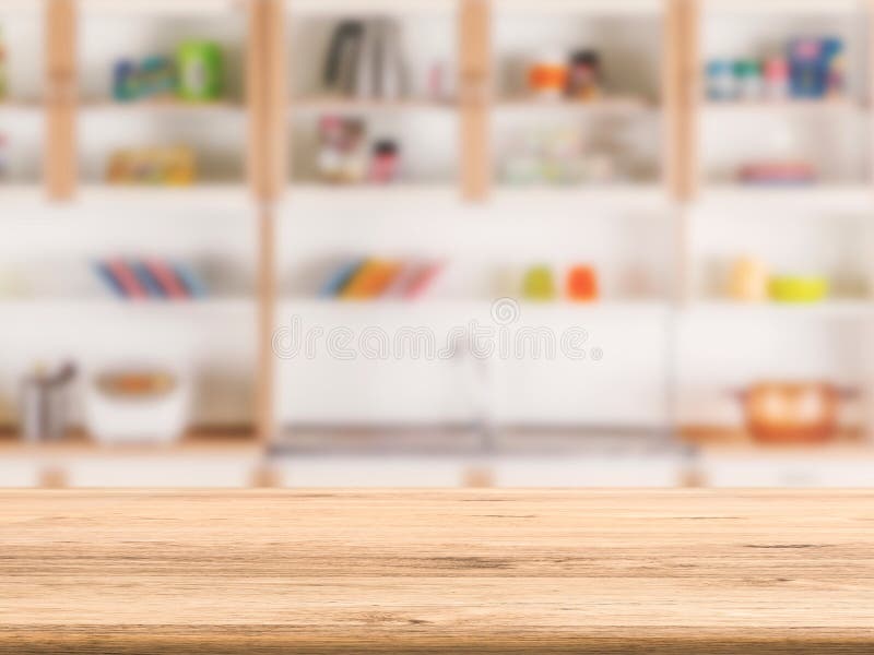 Wooden counter with kitchen cabinet background royalty free stock image