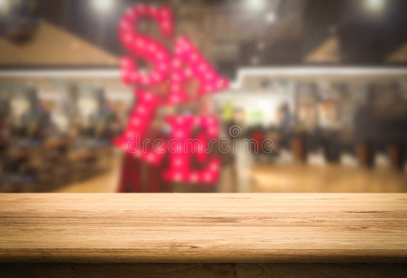 Wooden counter with sale sign background royalty free stock images