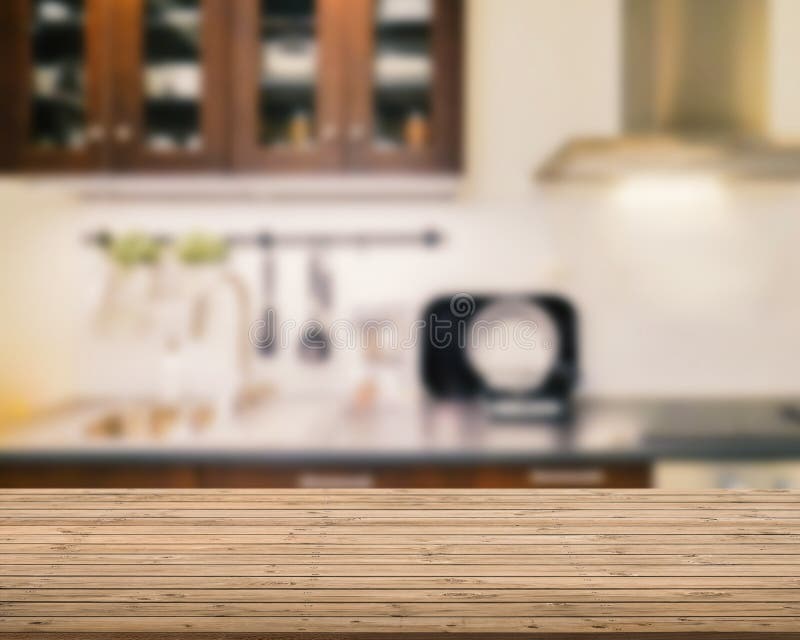 Wooden counter top with kitchen background royalty free stock photos