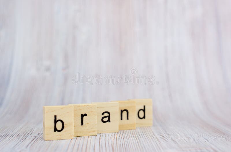 Wooden cubes with word brand on wooden table. Brand building for success concept stock photos Wooden cubes with word brand on wooden table. Brand building for success concept stock photos