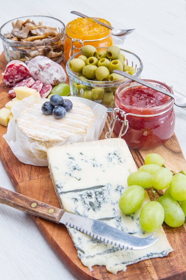 Wooden Cutting Board with Cheese, Cold Cuts and Jams Stock Photo Image of brie, board 139933398
