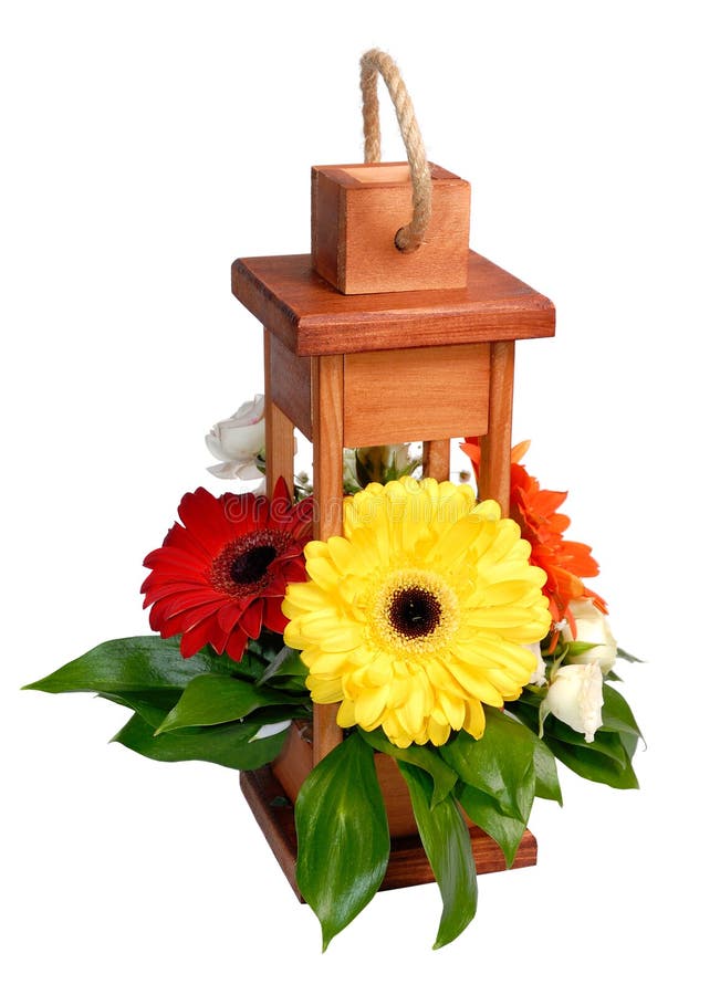 Wooden Decorative Lantern with Flowers Over White. Stock Photo Image