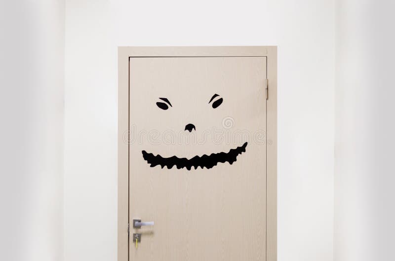 Door with Black Angry Scary Monster Face. Stock Photo - Image of