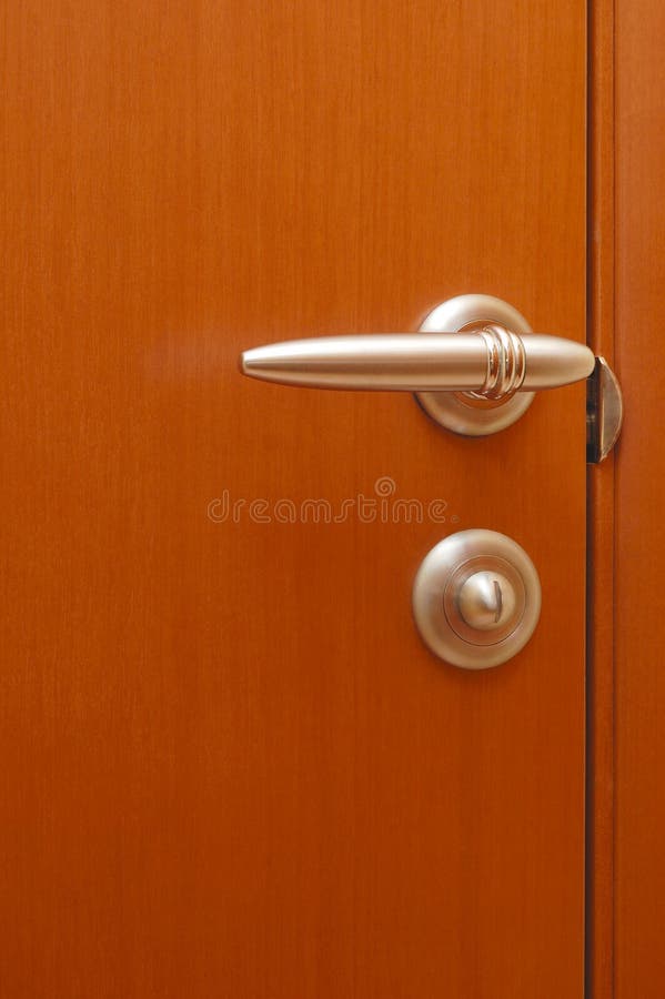 Wooden door with the handle royalty free stock photos