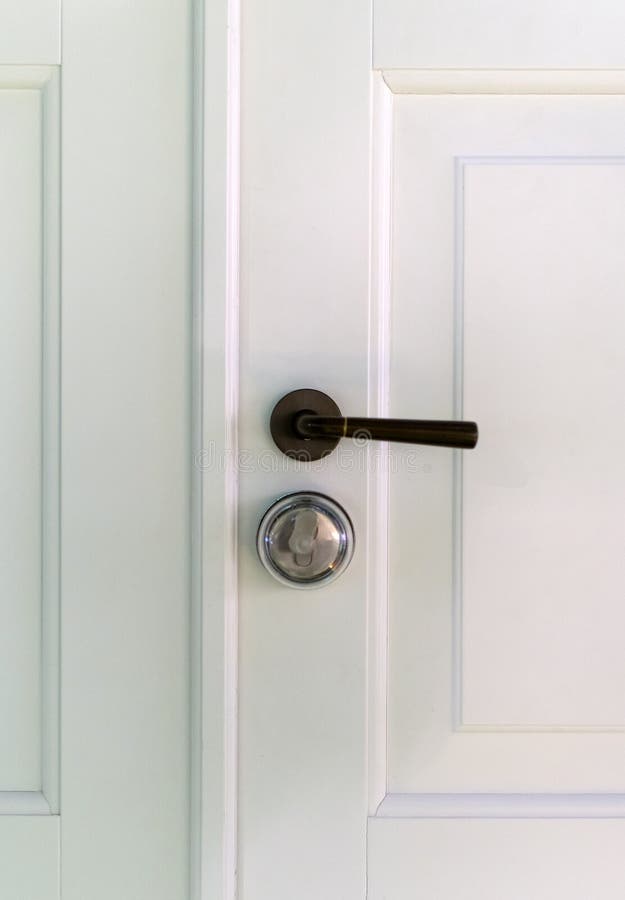 Wooden door with handle.