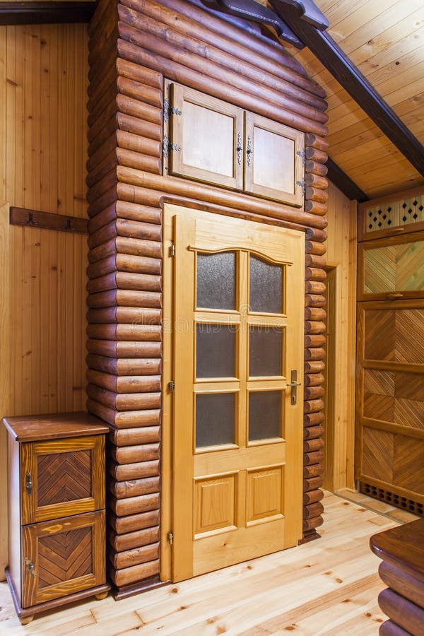 Wooden door on mountain rustic cedar home - detail