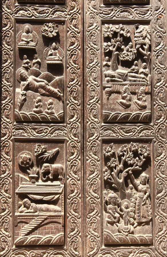 Wooden door with scenes from life of Buddha, Kathmandu, Nepal stock images Wooden door with scenes from life of Buddha, Kathmandu, Nepal stock images