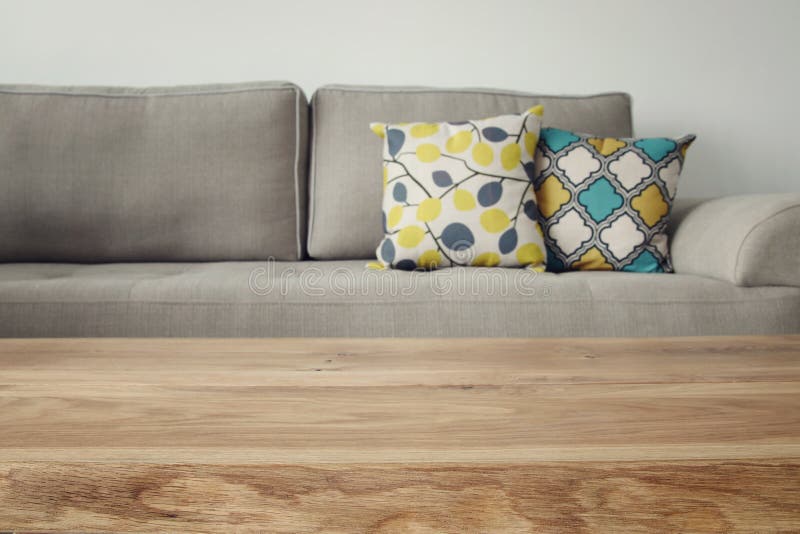 Wooden empty table in front of Living room sofa interior royalty free stock photography Wooden empty table in front of Living room sofa interior royalty free stock photography