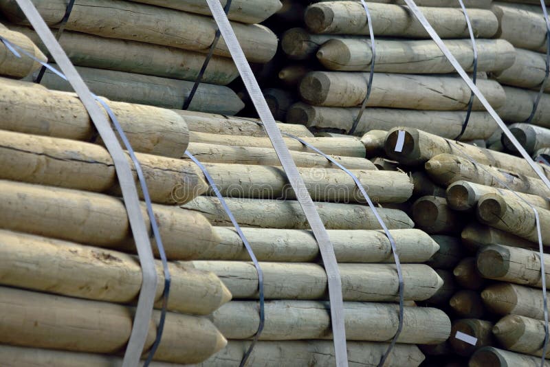 Wooden Fence Posts bundled for transport stock images