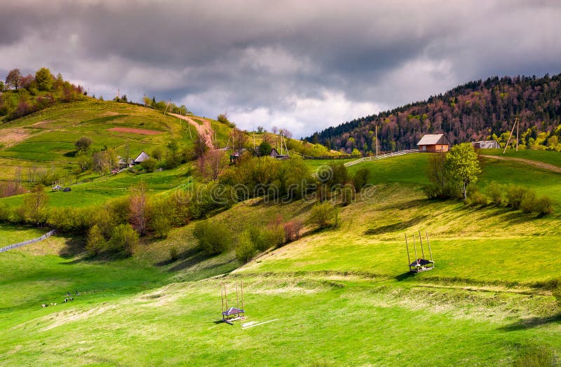 Wooden fences of rural area on grassy hillsides