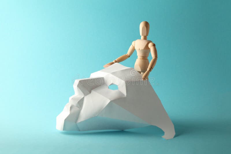 Wooden figure is an introvert - hiding behind paper mask. Closed in itself, hawto stock images Wooden figure is an introvert - hiding behind paper mask. Closed in itself, hawto stock images