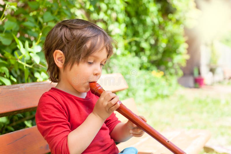 Man playing flute stock image. Image of music, teaching 561225